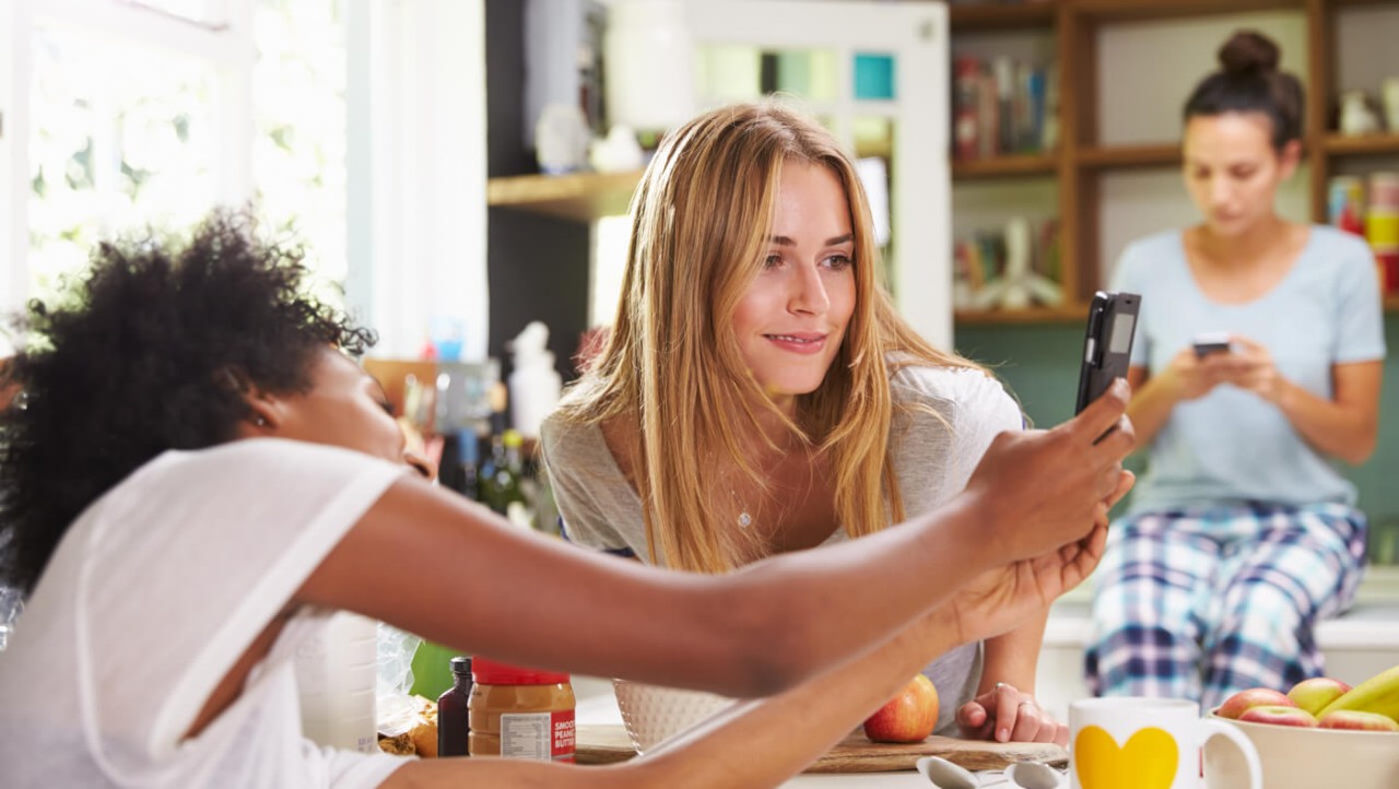 A 30-something investment representative explains something to a client. A 30-something investment representative explains something to a client.